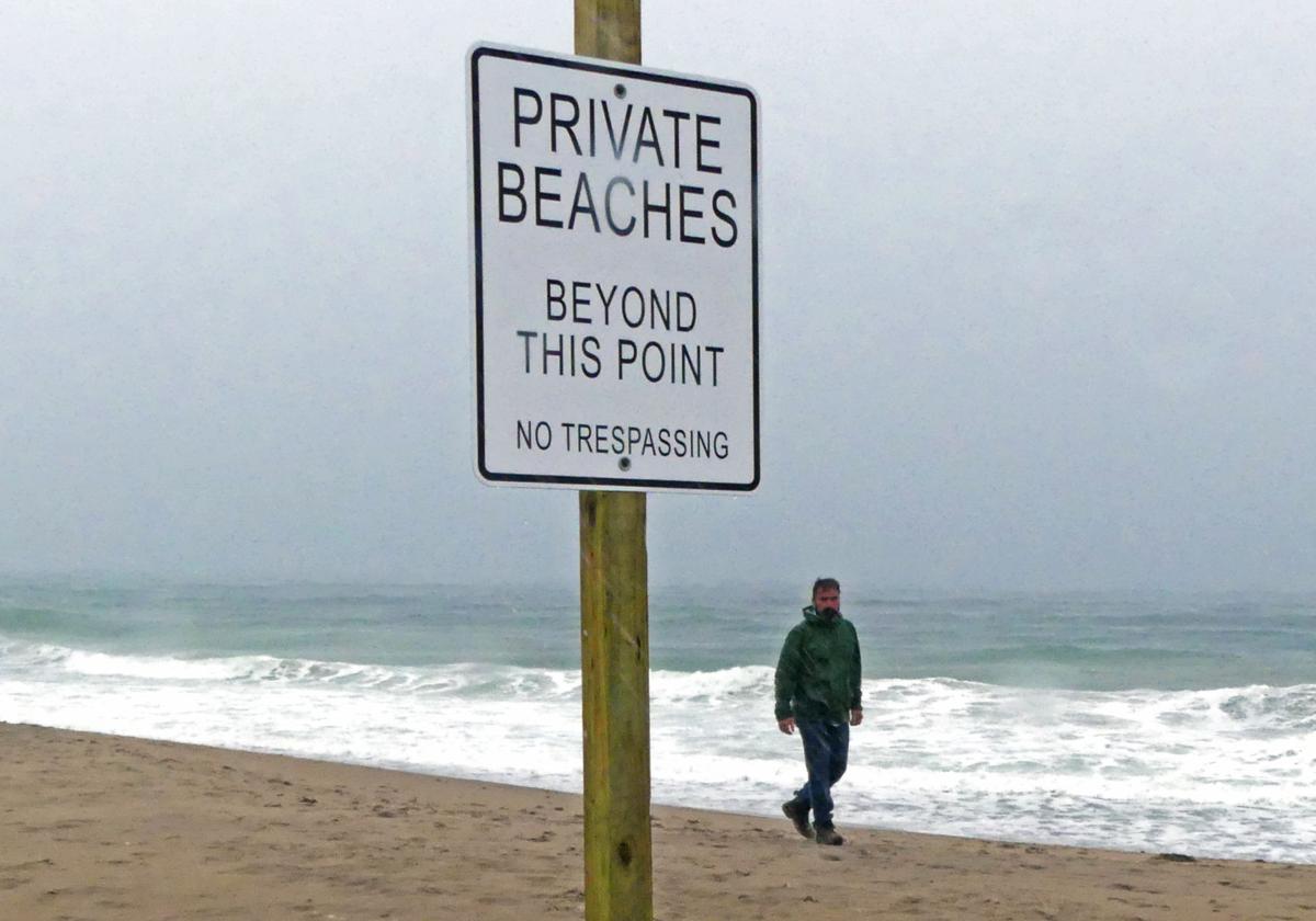 Private beach sign on public beach