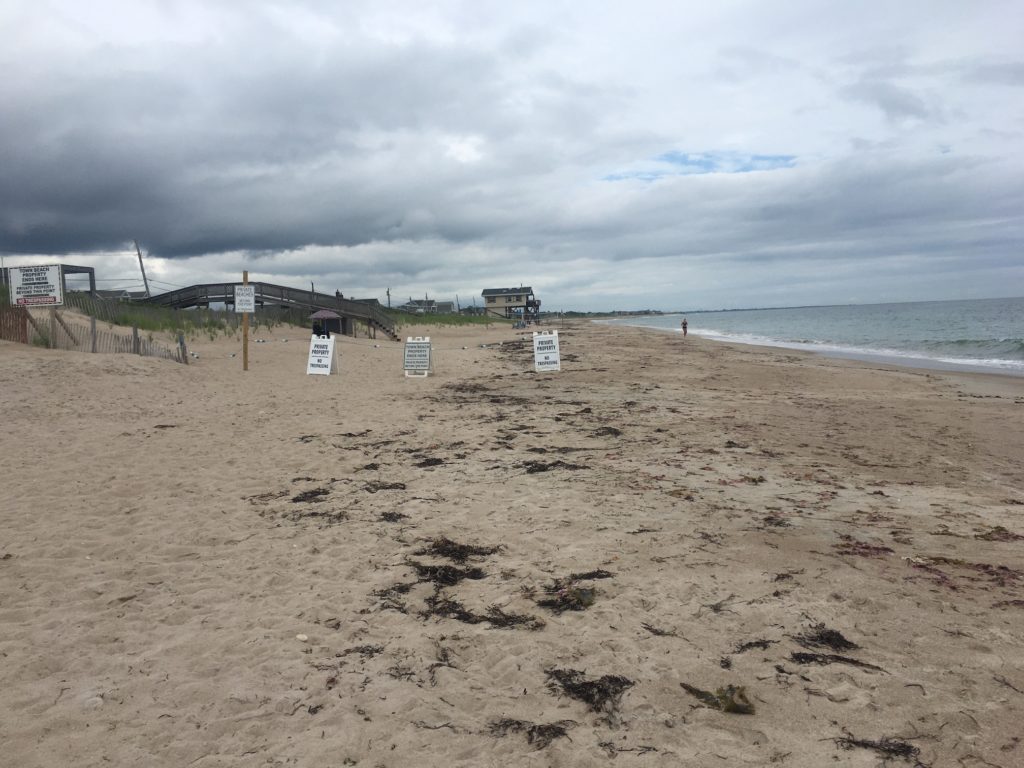 signs erroneously claiming beachfront "private" property